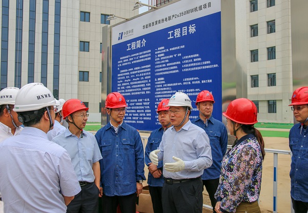 1  祝总一行与华能华亿(中国)一站式服务平台基建部主任马洪顺亲切交流.jpg